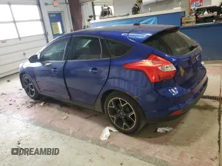 2012 Ford Focus SE z VIN 1FAHP3K23CL412887, wystawiony jako Copart lot #54366635 z przebiegiem 169 788 mil mil oraz Czysty tytuł • Clean title. Historia ofert i sprzedaży dostępna na DreamBid. Obrazek 2.