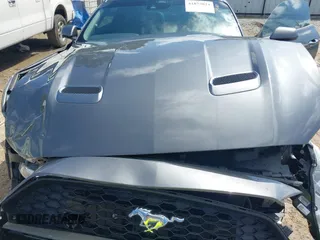 2023 Ford Mustang EcoBoost with VIN 1FA6P8TH6P5105487, listed as a IAAI auction lot 41877024 with 24,066 mi miles. Bid and sale history available at carsss.com. Image 10.
