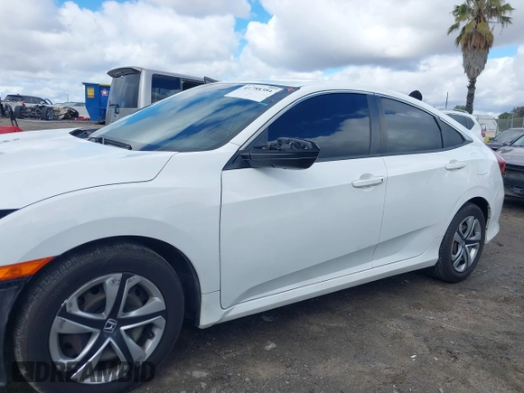 2018 Honda Civic LX with VIN 2HGFC2F5XJH603214, listed as a IAAI auction lot 41788384 with 114,876 mi miles and . Bid and sale history available at carsss.com. Image 15.