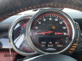 2016 MINI Hardtop John Cooper Works with VIN WMWXM9C50GT997764, listed as a Copart auction lot 52826365 with 82,430 mi miles and Salvage title. Bid and sale history available at DreamBid. Image 9.