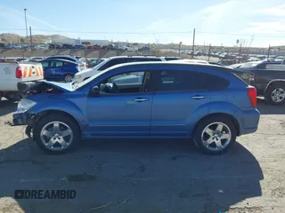 2007 Dodge Caliber R/T z VIN 1B3HB78KX7D130934, wystawiony jako IAAI lot #41871876 z przebiegiem Nie podano mil oraz . Historia ofert i sprzedaży dostępna na DreamBid. Obrazek 14.