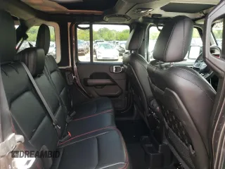 2018 Jeep Wrangler Unlimited Rubicon with VIN 1C4HJXFG1JW261472, listed as a Copart auction lot 63259345 with 60,457 mi miles and Salvage title. Bid and sale history available at DreamBid. Image 10.