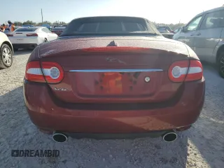 2013 Jaguar XK with VIN SAJWA4GB9DLB51059, listed as a Copart auction lot 77322014 with 0 mi miles and Salvage Title. Bid and sale history available at carsss.com. Image 6.