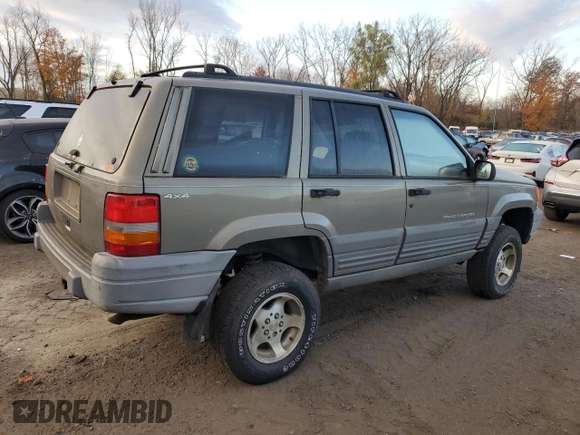 1997 Jeep Grand Cherokee Laredo with VIN 1J4GZ58S1VC741586, listed as a Copart auction lot 77619394 with 0 mi miles and Clean Title. Bid and sale history available at carsss.com. Image 3.
