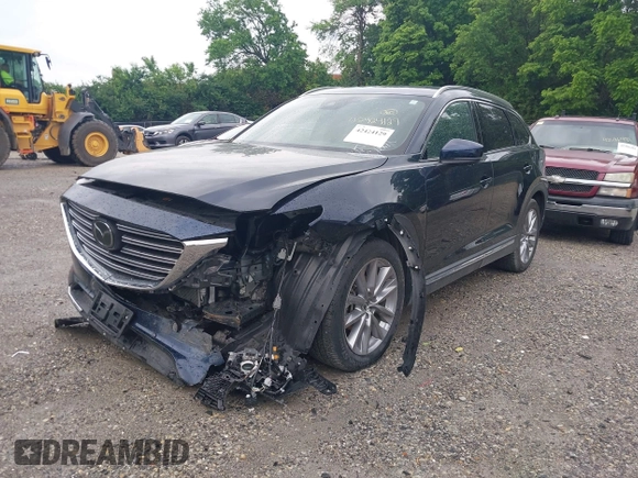 2021 Mazda CX-9 Carbon Edition z VIN JM3TCBDY7M0536005, wystawiony jako IAAI lot #42424129 z przebiegiem 48 005 mil mil oraz . Historia ofert i sprzedaży dostępna na DreamBid. Obrazek 2.