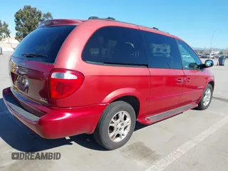 2001 Dodge Grand Caravan with VIN 2B4GT44L31R196487, listed as a IAAI auction lot 41762495 with 164,571 mi miles and . Bid and sale history available at DreamBid. Image 4.