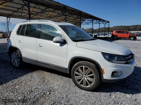 2015 Volkswagen Tiguan S with VIN WVGAV7AXXFW576514, listed as a Copart auction lot 45906025 with 90,302 mi miles and Salvage Title. Bid and sale history available at carsss.com. Image 4.