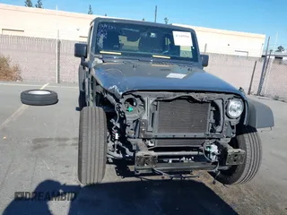 2018 Jeep Wrangler JK Unlimited Sport S with VIN 1C4BJWDG4JL868700, listed as a IAAI auction lot 41349566 with 68,539 mi miles. Bid and sale history available at carsss.com. Image 12.