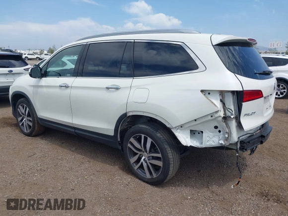 2017 Honda Pilot Touring with VIN 5FNYF5H95HB042632, listed as a IAAI auction lot 42011885 with 103,321 mi miles. Bid and sale history available at carsss.com. Image 3.