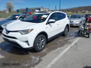 2016 Toyota RAV4 Hybrid XLE with VIN JTMRJREV1GD017731, listed as a IAAI auction lot 41860447 with 115,787 mi miles. Bid and sale history available at carsss.com. Image 2.