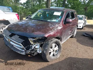 2012 Dodge Durango SXT with VIN 1C4RDJAG5CC172783, listed as a IAAI auction lot 42439477 with 191,890 mi miles and . Bid and sale history available at DreamBid. Image 2.