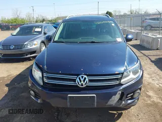 2012 Volkswagen Tiguan S with VIN WVGBV7AX2CW566981, listed as a IAAI auction lot 42069748 with 153,613 mi miles and . Bid and sale history available at DreamBid. Image 13.