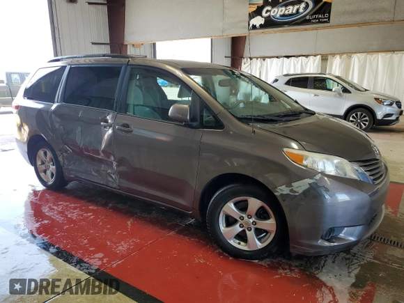2011 Toyota Sienna LE AAS with VIN 5TDKK3DC8BS117009, listed as a Copart auction lot 56035065 with 148,160 mi miles and Salvage Title. Bid and sale history available at DreamBid. Image 4.