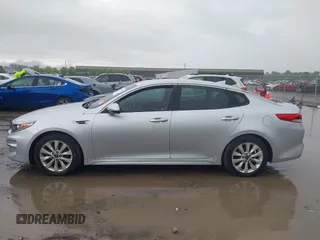 2016 Kia Optima LX z VIN 5XXGT4L37GG010780, wystawiony jako IAAI lot #42320573 z przebiegiem 154 662 mil mil oraz . Historia ofert i sprzedaży dostępna na DreamBid. Obrazek 14.