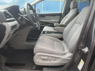 2018 Honda Odyssey with VIN 5FNRL6H49JB504977, listed as a Copart auction lot 60905615 with 180,464 mi miles and Clean title. Bid and sale history available at DreamBid. Image 7.