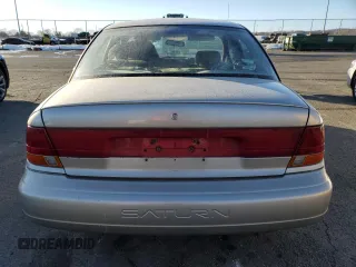 1999 Saturn SL z VIN 1G8ZK5272XZ163225, wystawiony jako Copart lot #41788725 z przebiegiem 144 999 mil mil oraz Szkoda całkowita • Salvage title. Historia ofert i sprzedaży dostępna na DreamBid. Obrazek 6.