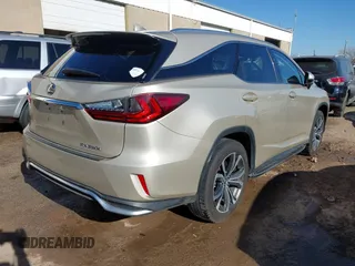 2018 Lexus RX with VIN JTJGZKCA2J2000394, listed as a IAAI auction lot 41400234 with 7,940 mi miles. Bid and sale history available at carsss.com. Image 4.