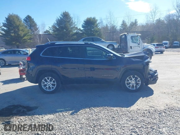 2015 Jeep Cherokee Latitude with VIN 1C4PJMCB3FW652553, listed as a IAAI auction lot 41881238 with 161,944 mi miles and . Bid and sale history available at DreamBid. Image 13.