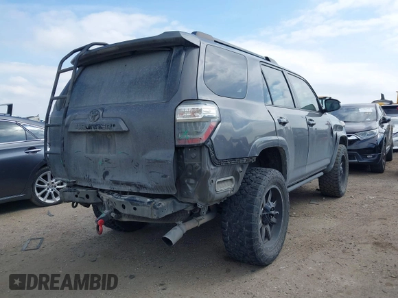 2015 Toyota 4Runner SR5 with VIN JTEZU5JRXF5091016, listed as a IAAI auction lot 41592829 with 196,988 mi miles and . Bid and sale history available at DreamBid. Image 4.