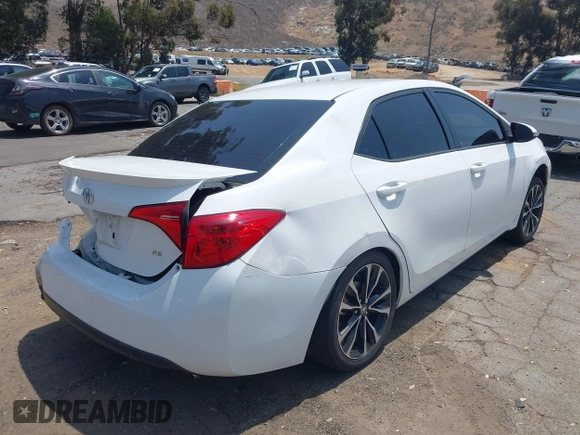 2017 Toyota Corolla L with VIN 5YFBURHE3HP610414, listed as a IAAI auction lot 42410369 with 157,908 mi miles and . Bid and sale history available at DreamBid. Image 4.