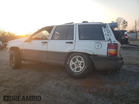 1993 Jeep Grand Cherokee Laredo with VIN 1J4GZ58Y9PC677532, listed as a Copart auction lot 44391245 with 178,772 mi miles and Salvage Title. Bid and sale history available at carsss.com. Image 2.