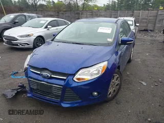 2012 Ford Focus SE with VIN 1FAHP3F23CL345654, listed as a IAAI auction lot 42231539 with 77,360 mi miles and . Bid and sale history available at DreamBid. Image 2.