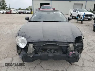 2010 Jaguar XK with VIN SAJWA4GBXALB36341, listed as a Copart auction lot 68307584 with 76,951 mi miles and Salvage Title. Bid and sale history available at carsss.com. Image 5.