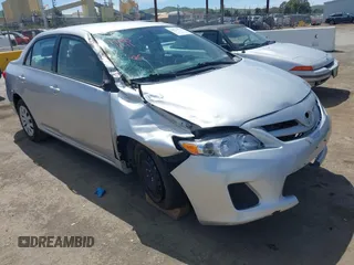 2011 Toyota Corolla L with VIN 2T1BU4EE1BC572731, listed as a IAAI auction lot 42024851 with 153,923 mi miles. Bid and sale history available at carsss.com. Image 1.