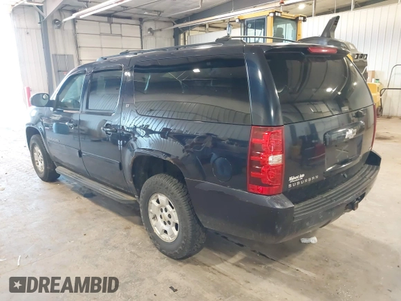 2009 Chevrolet Suburban LT w/1LT with VIN 1GNFK26319R272557, listed as a IAAI auction lot 42138238 with 223,599 mi miles. Bid and sale history available at carsss.com. Image 3.