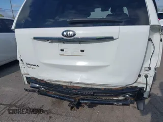 2014 Kia Sedona LX with VIN KNDMG4C75E6545483, listed as a IAAI auction lot 42166152 with 121,827 mi miles and . Bid and sale history available at carsss.com. Image 6.