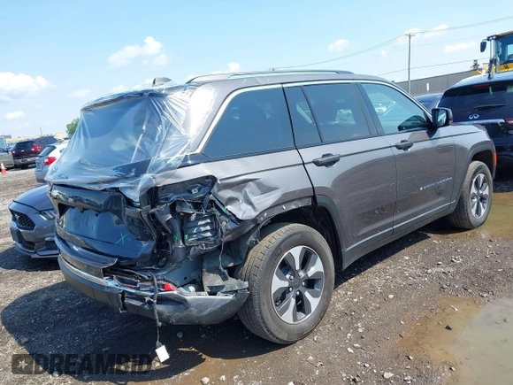 2022 Jeep Grand Cherokee with VIN 1C4RJYB67N8716360, listed as a IAAI auction lot 42464479 with 17,208 mi miles and . Bid and sale history available at DreamBid. Image 4.