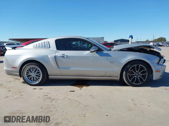 2013 Ford Mustang GT with VIN 1ZVBP8CF5D5232781, listed as a IAAI auction lot 40917812 with 130,447 mi miles. Bid and sale history available at carsss.com. Image 13.