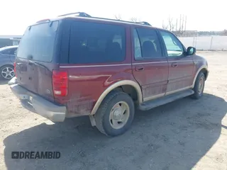 1998 Ford Expedition XLT z VIN 1FMPU18L0WLB53634, wystawiony jako IAAI lot #41895376 z przebiegiem 223 475 mil mil oraz . Historia ofert i sprzedaży dostępna na DreamBid. Obrazek 4.