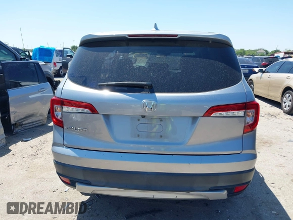 2019 Honda Pilot EX-L with VIN 5FNYF5H58KB040331, listed as a IAAI auction lot 41977727 with 90,655 mi miles and . Bid and sale history available at DreamBid. Image 16.