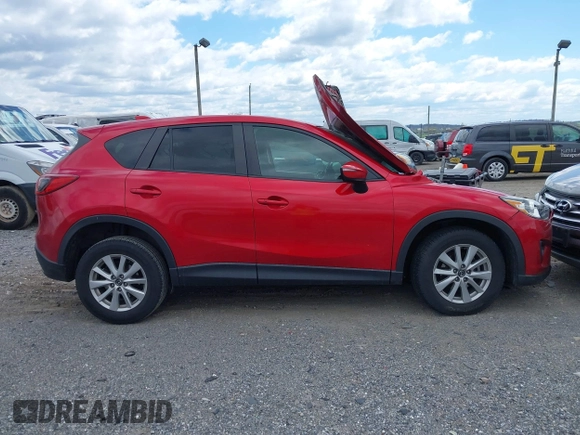 2015 Mazda CX-5 Touring with VIN JM3KE4CY7F0492559, listed as a IAAI auction lot 42053447 with 95,675 mi miles. Bid and sale history available at carsss.com. Image 13.