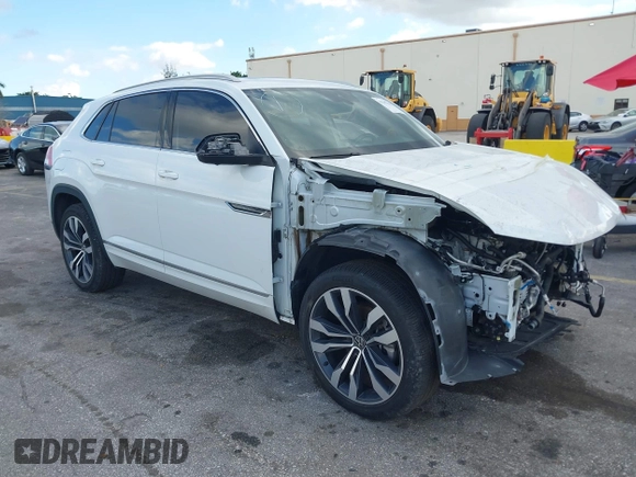 2021 Volkswagen Atlas SEL Premium R-Line with VIN 1V2FE2CA2MC206046, listed as a IAAI auction lot 41547596 with 13,805 mi miles and . Bid and sale history available at DreamBid. Image 1.