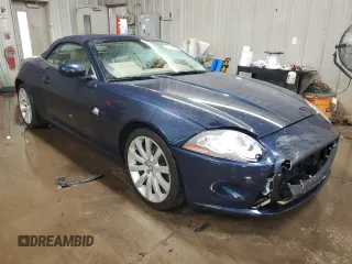 2007 Jaguar XK with VIN SAJDA44BX75B00447, listed as a Copart auction lot 50147695 with 119,467 mi miles and Salvage Title. Bid and sale history available at carsss.com. Image 4.