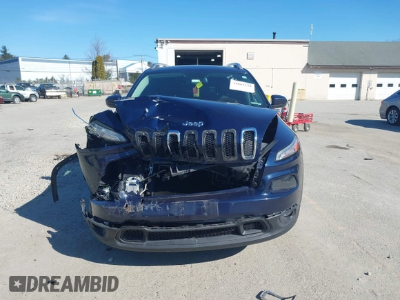 2015 Jeep Cherokee Latitude with VIN 1C4PJMCB3FW652553, listed as a IAAI auction lot 41881238 with 161,944 mi miles and . Bid and sale history available at DreamBid. Image 12.