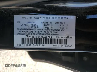 2012 Mazda 3 i Sport with VIN JM1BL1UG0C1642729, listed as a Copart auction lot 54956425 with 97,082 mi miles and Salvage Title. Bid and sale history available at DreamBid. Image 13.