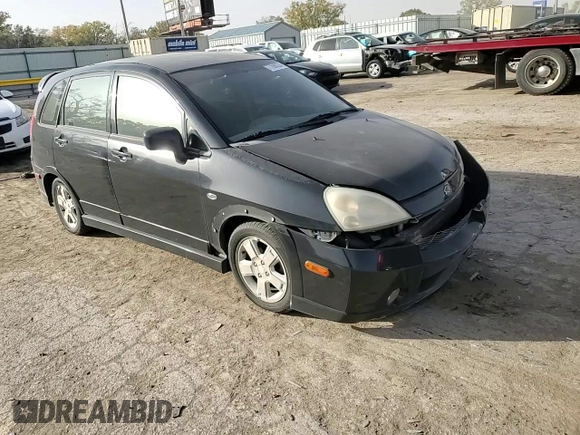 2003 Suzuki Aerio SX z VIN JS2RC41H135205642, wystawiony jako Copart lot #77690224 z przebiegiem 161 414 mil mil oraz Szkoda całkowita • Salvage title. Historia ofert i sprzedaży dostępna na DreamBid. Obrazek 11.