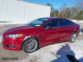 2014 Ford Fusion Titanium Hybrid with VIN 3FA6P0RUXER289087, listed as a IAAI auction lot 41418491 with 126,849 mi miles. Bid and sale history available at carsss.com. Image 6.