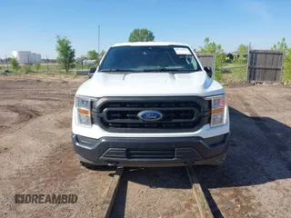 2021 Ford F-150 XL with VIN 1FTFX1E59MFC09787, listed as a IAAI auction lot 42162828 with 96,215 mi miles and . Bid and sale history available at DreamBid. Image 12.