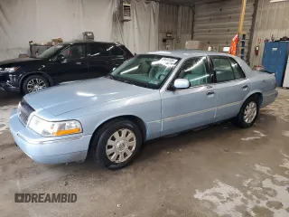 2003 Mercury Grand Marquis LS Premium z VIN 2MEHM75W33X645484, wystawiony jako Copart lot #58664585 z przebiegiem 145 064 mil mil oraz Tytuł czysty. Historia ofert i sprzedaży dostępna na DreamBid. Obrazek 1.