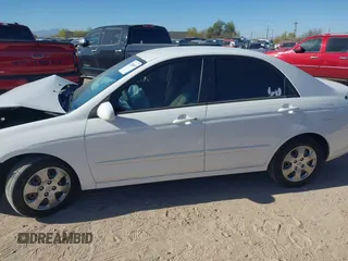 2009 Kia Spectra EX with VIN KNAFE222695588022, listed as a IAAI auction lot 42106609 with 153,688 mi miles. Bid and sale history available at carsss.com. Image 14.