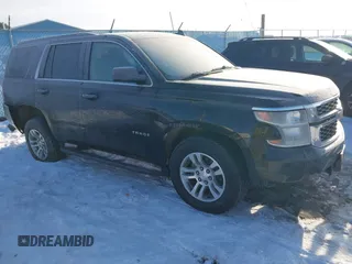 2020 Chevrolet Tahoe LT z VIN 1GNSKBKC9LR309818, wystawiony jako IAAI lot #41420268 z przebiegiem 131 823 mil mil oraz . Historia ofert i sprzedaży dostępna na DreamBid. Obrazek 1.