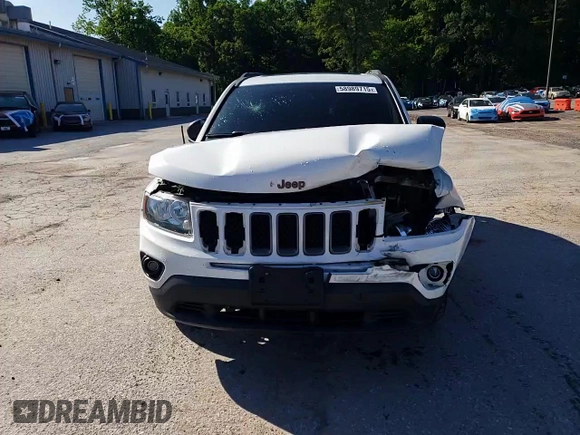 2017 Jeep Compass Sport with VIN 1C4NJCBB1HD141280, listed as a Copart auction lot 58989715 with 61,744 mi miles and Salvage title. Bid and sale history available at DreamBid. Image 14.