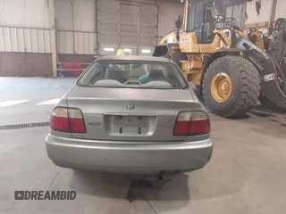 1996 Honda Accord LX with VIN 1HGCD563XTA141867, listed as a IAAI auction lot 41015252 with 420,800 mi miles and . Bid and sale history available at carsss.com. Image 16.