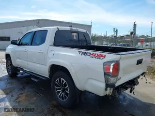 2020 Toyota Tacoma 4WD SR5 with VIN 3TMCZ5AN3LM309635, listed as a IAAI auction lot 41598363 with 99,080 mi miles. Bid and sale history available at carsss.com. Image 3.