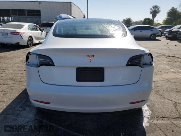 2023 Tesla Model 3 with VIN 5YJ3E1EA7PF450343, listed as a Copart auction lot 52446595 with 36,137 mi miles and Salvage Title. Bid and sale history available at DreamBid. Image 6.