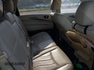 2015 Infiniti QX60 z VIN 5N1AL0MM8FC517929, wystawiony jako IAAI lot #42118295 z przebiegiem 104 188 mil mil oraz . Historia ofert i sprzedaży dostępna na DreamBid. Obrazek 8.
